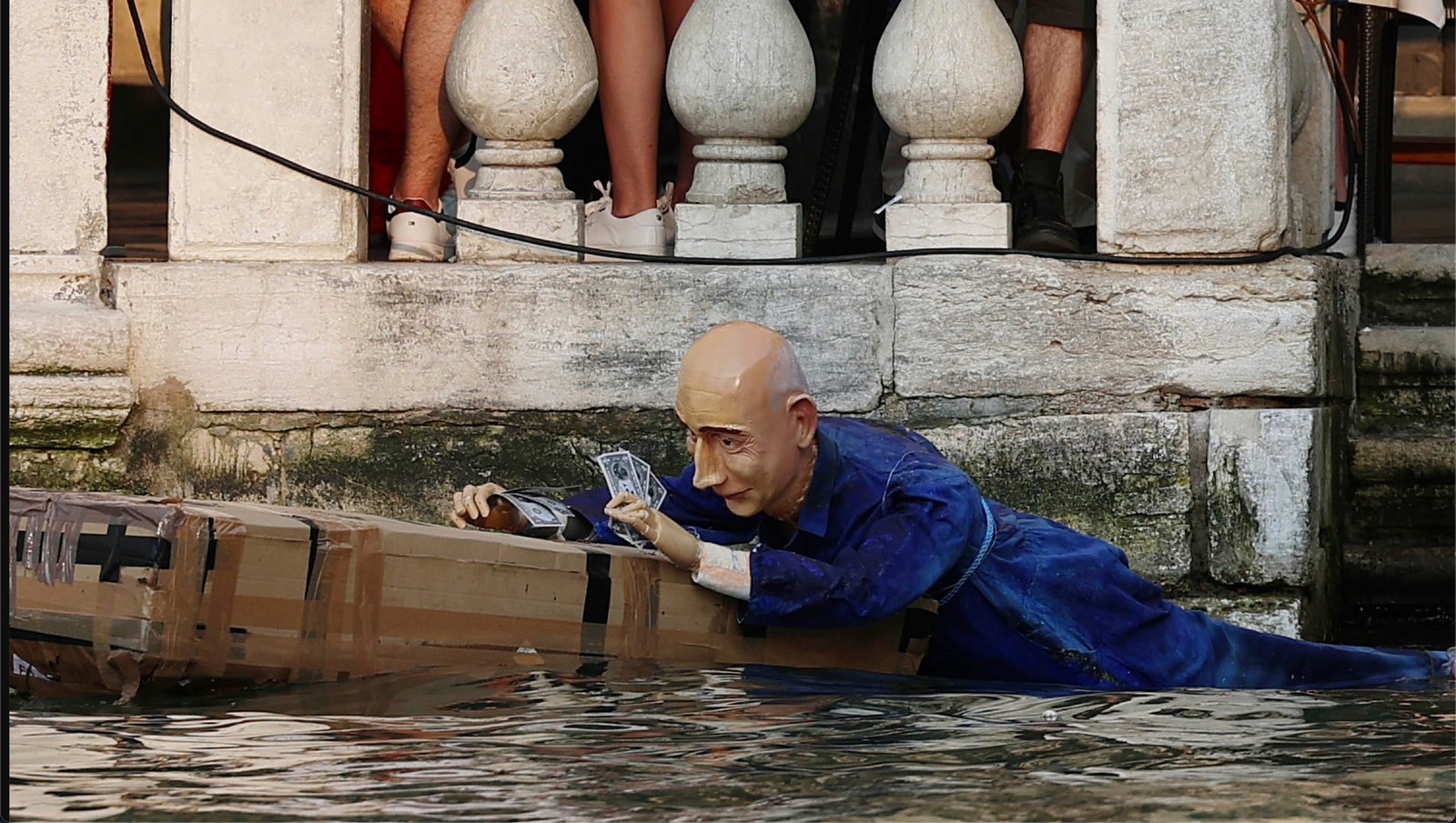 Jeff Bezos Wedding Protest Turns Viral Spectacle as Effigy Is Thrown Into Venice Canal Lauren Sanchez